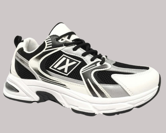 Zapatillas unisex de estilo deportivo en blanco y negro